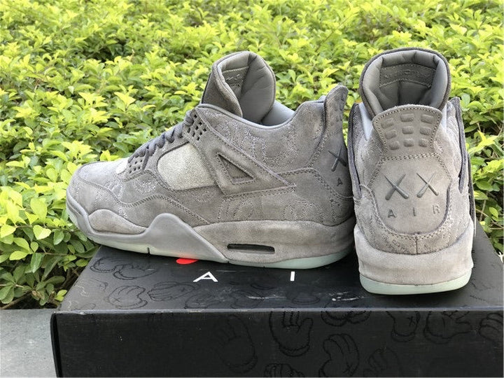 KAWS x Air Jordan 4 “Cool Grey”