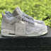 KAWS x Air Jordan 4 “Cool Grey”